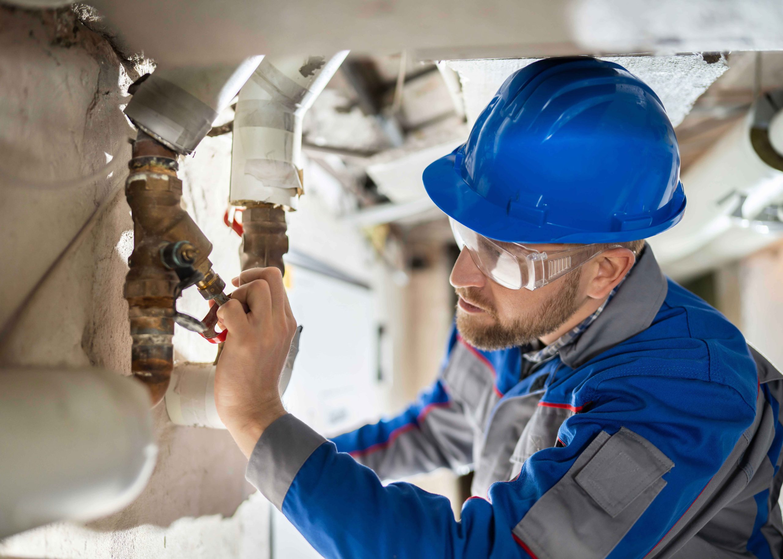 water repair expert fixing a pipe in Boynton Beach, FL